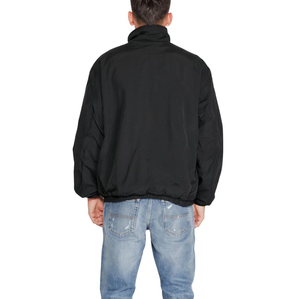 Tommy Hilfiger Jeans Schwarze recycelte Polyesterjacken & Mantel
