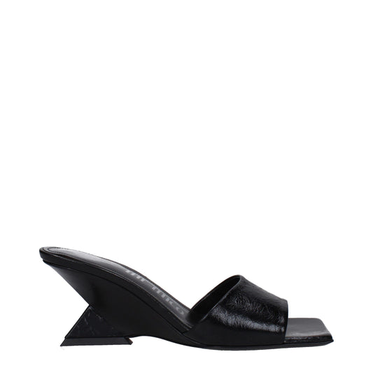 The Attico Schwarze Leder flache Sandalen